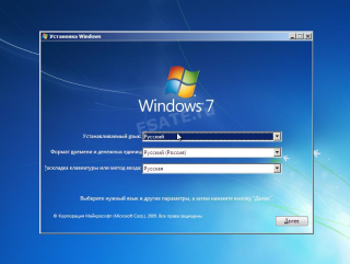 Начало установки windows 7: выбор устанавливаемого языка, формата времени и раскладки.